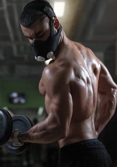 bodybuilding with a mask in gym